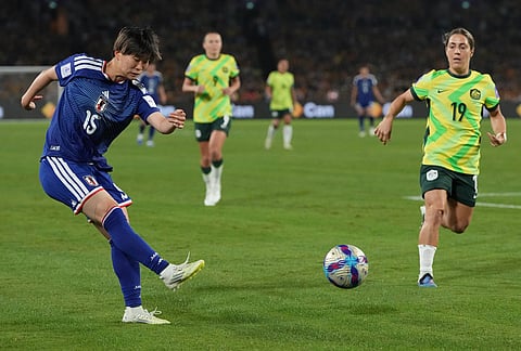Japan's Aoba Fujino kicks the ball during the Women's Asian Cup soccer final between Japan and Australia in Sydney.