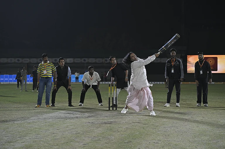 Devkinandan Thakur and Vijay Sharma, founder of the Sanatan Cricket Club, performing a ritual to mark the inauguration of the Sanatan Premier League - X