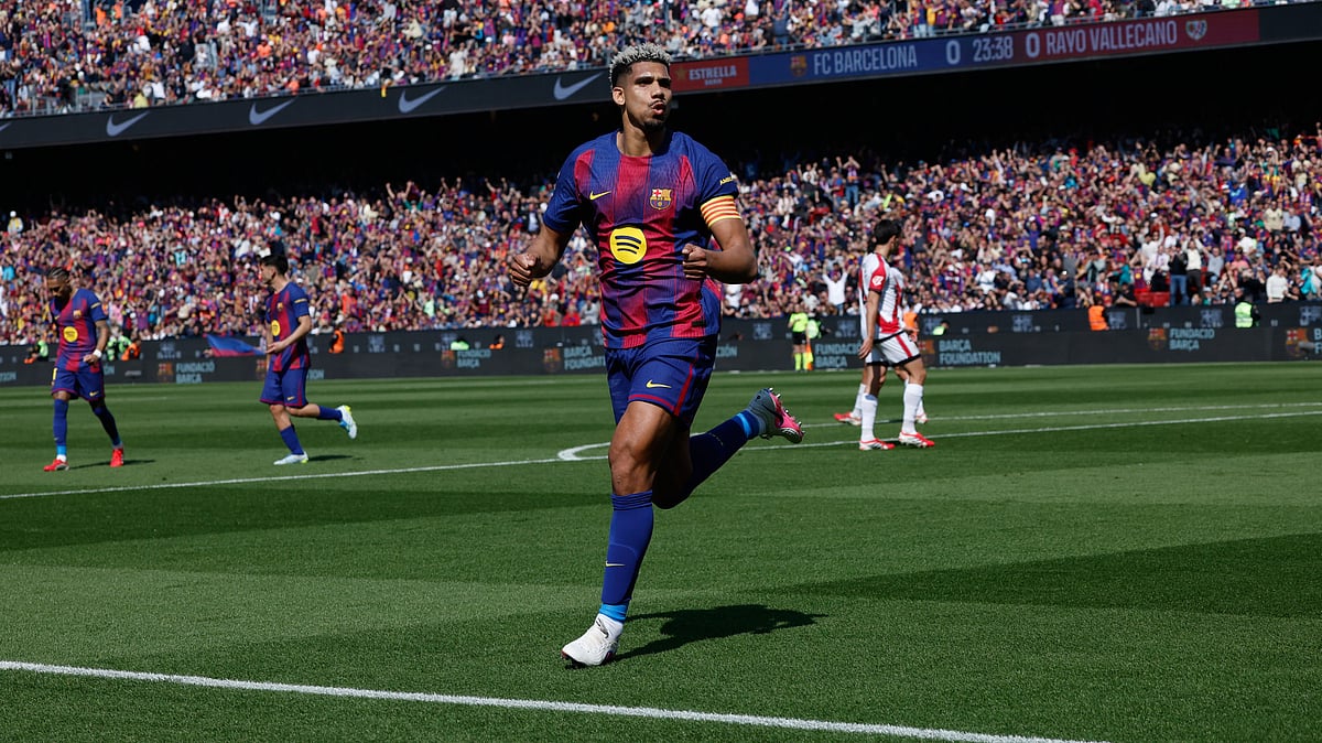 Barcelona's Ronald Araujo celebrates after scoring during a La Liga soccer match between Barcelona and Rayo Vallecano in Barcelona, Spain, Sunday, March 22, 2026. - | Photo: AP/Joan Monfort