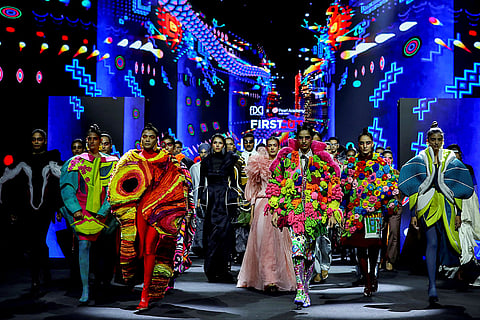 Models showcase creations by students of Pearl Academy during the Lakme Fashion Week (LFW), in Mumbai.