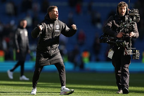 Brighton's head coach Fabian Huerzeler reacts after he English Premier League soccer match between Brighton and Liverpool in Brighton.