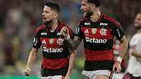| Photo: AP/Bruna Prado : Jorginho of Brazil's Flamengo, left, celebrates with teammate Leo Pereira after scoring his side's second goal, from the penalty spot, during the Recopa Sudamericana second leg final soccer match against Argentina's Lanus in Rio de Janeiro, Thursday, Feb. 26, 2026.