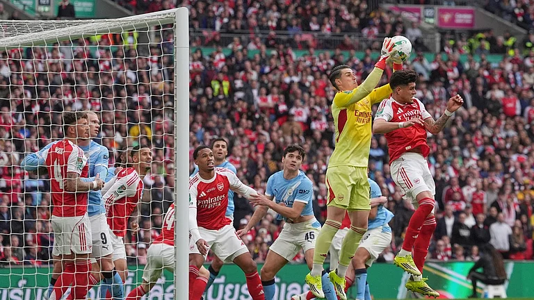 Arsenal's goalkeeper Kepa Arrizabalaga colletcs the ball during the English League Cup final soccer match between Arsenal and Manchester City in London, Sunday, March 22, 2026. - AP Photo