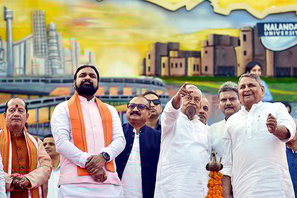Bihar Chief Minister Nitish Kumar with state Deputy CM Samrat Choudhary during an event on "Bihar Diwas", the day on which the province, which was earlier a part of the Bengal presidency, came into being over a century ago, in Patna. - | Photo: PTI