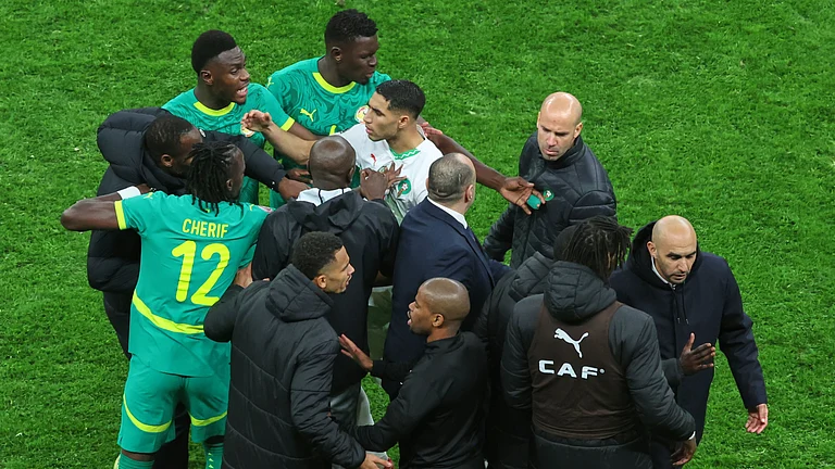 Morocco's Achraf Hakimi, center, clashes with Senegal players after a controversial penalty was awarded to Morocco late on during the Africa Cup of Nations final soccer match between Senegal and Morocco in Rabat, Morocco, Sunday, Jan. 18, 2026. - | Photo: AP/Youssef Loulidi