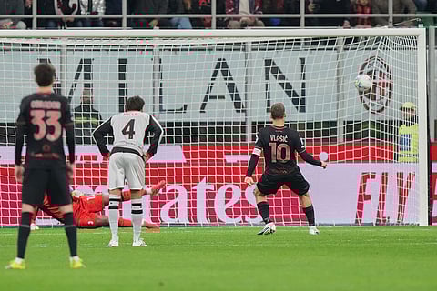 Torino's Nikola Vlasic (10) scores his side's 2nd goal from the penalty spot during the Serie A soccer match between AC Milan and Torino, in Milan, Italy.