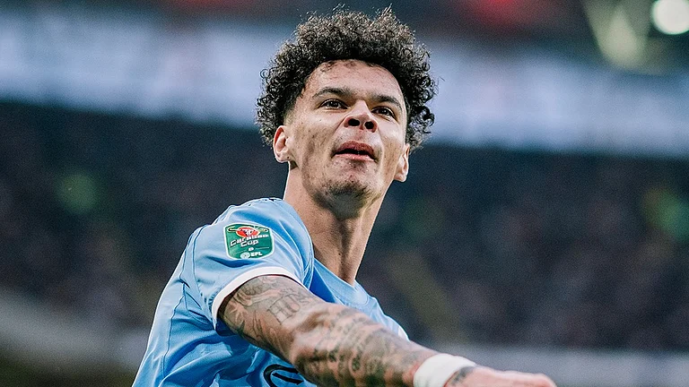 Nico O'Reilly celebrates after scoring against Arsenal in EFL Cup 2025-26 Final at Wembley Stadium. - ManCity/X