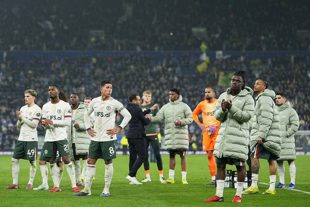 Chelsea players react disappointed after the English Premier League soccer match between Everton and Chelsea in Liverpool, England. - | Photo: AP/Jon Super
