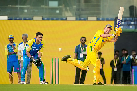 Former cricketer Michael Hussey, right, plays a shot during the Chennai Super Kings’ ROAR 2026, pre-season fan event, at M. A. Chidambaram Stadium in Chennai.