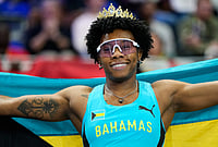 World Athletics Indoor C'ships 2026: Charlton Matches Own WR Of 7.65 In 60m Hurdles | Photo: AP/Matthias Schrader : Devynne Charlton, of Bahamas, poses after winning the gold medal in the women's 60 meters hurdles final at the World Athletics Indoor Championships in Torun, Poland.