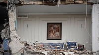 US-Israel’s ‘Fast Dash’ Vs Iran’s ‘Last Stand’, Vali Nasr Decodes The Long Game Photo: AP Photo/Vahid Salemi : Rubble covers the furniture of a destroyed living room in a residential building hit in an earlier U.S.-Israeli strike in Tehran, Iran, Monday, March 23, 2026.
