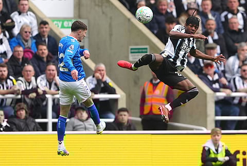 Sunderland's Trai Hume, left, and Newcastle United's Anthony Elanga battle for the ball during the Premier League match between Newcastle and Sunderland outside St James' Park, Newcastle upon Tyne, England.