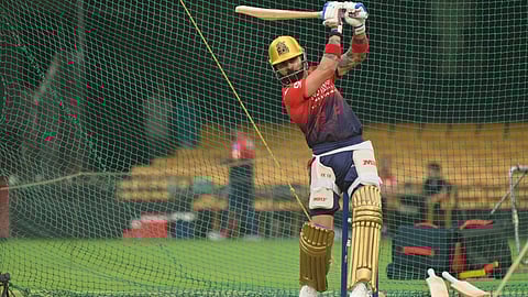 Virat Kohli plays a shot during RCB's practice session at the Chinnaswamy Stadium in Bengaluru
