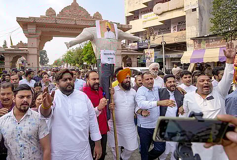 BJP leaders and workers protest against Punjab Government over the suicide of a state warehousing corporation official, in Amritsar, Punjab. Gagandeep Singh Randhawa, the district manager of Punjab State Warehousing Corporation in Amritsar, allegedly ended his life by consuming poison early Saturday. 