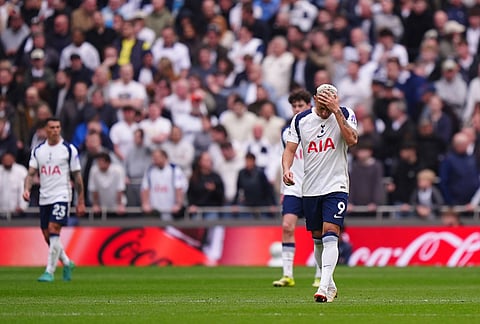 Tottenham Hotspur's Richarlison appears dejected after his side concede a second goal, during the English Premier League soccer match between Tottenham Hotspur and Nottingham Forest, in London.