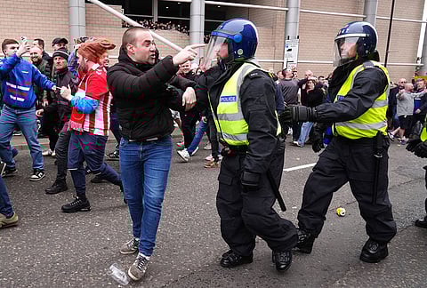 Sunderland fans clash with Newcastle United fans as police attempt to intervene before the Premier League match between Newcastle and Sunderland outside St James' Park, Newcastle upon Tyne, England.