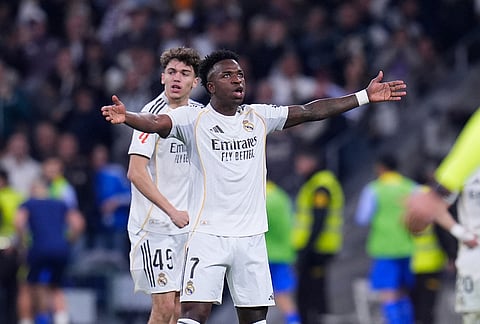 Real Madrid's Vinicius Junior celebrates after scoring his side's first goal the Spanish La Liga soccer match between Real Madrid and Atletico Madrid in Madrid, Spain.