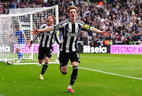 Newcastle United's Anthony Gordon celebrates scoring their side's first goal of the game during the Premier League match between Newcastle and Sunderland outside St James' Park, Newcastle upon Tyne, England.