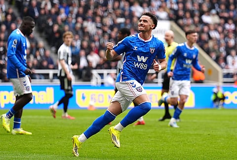 Sunderland's Chemsdine Talbi celebrates scoring his side's first goal of the game, during the English Premier League soccer match between Newcastle and Sunderland, in Newcastle upon Tyne, England.