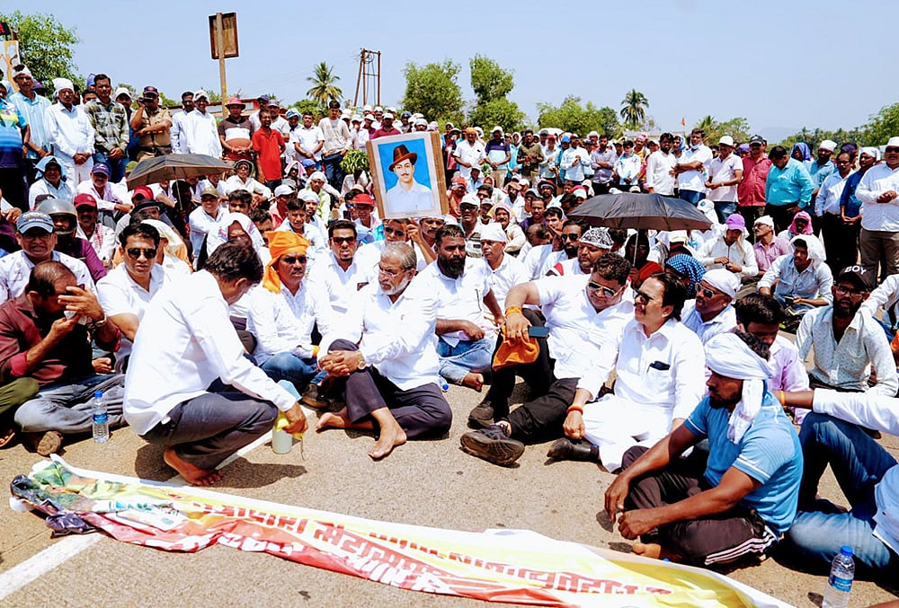 Mango and cashew farmers from the Konkan region stage a protest under the leadership of Raju Shetti of Swabhimani Shetkari Sanghatana, blocking the Mumbai–Goa National Highway from 11 AM on March 23, demanding urgent government action after crop losses caused by erratic weather. - | Photo: Dinesh Parab/Outlook