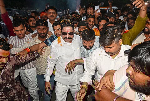 Mokama MLA Anant Singh being greeted by supporters after his release on bail from Beur Jail, in Patna, Bihar.