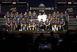 | Photo: PTI : Gujarat Titans skipper Shubman Gill with team players, GT's directors Shaan Mehta and Jinal Mehta, former England player and GT’s director of cricket Vikram Solanki and others pose for a group photograph during the franchise's "Shubharambh 2026" event featuring the squad, owners and partners, in Ahmedabad.