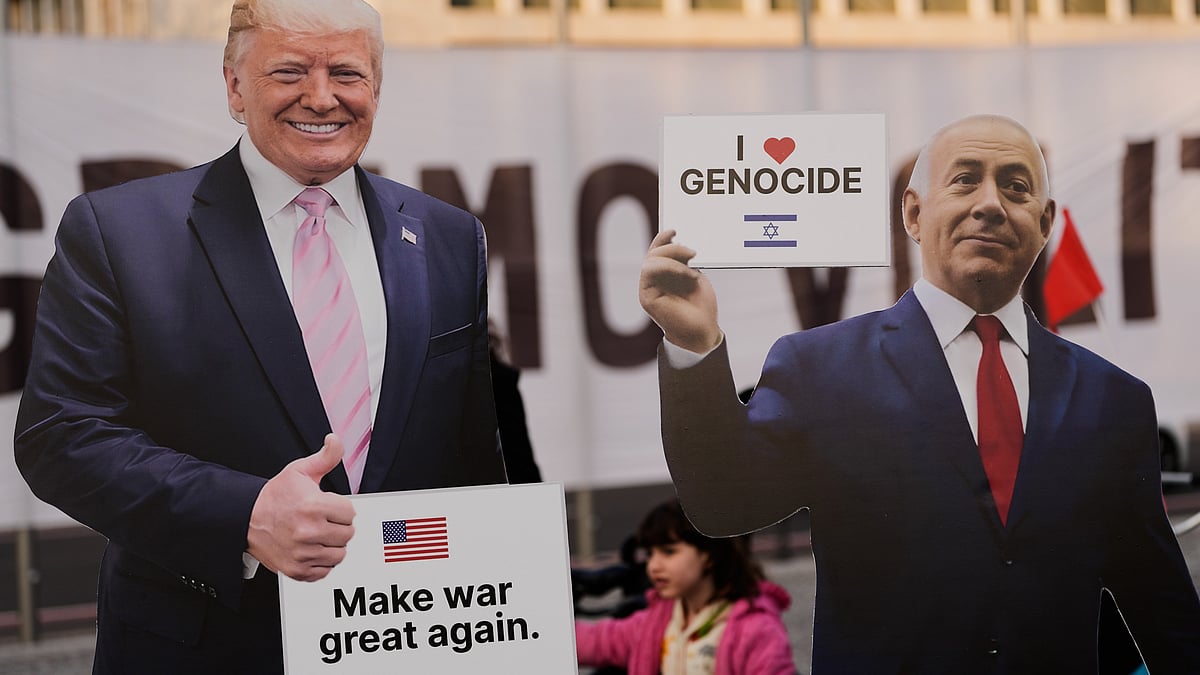 Life size effigies of President Donald Trump, left, and Israeli Prime Minister Benjamin Netanyahu, are set near the Parliament building by left wing protesters calling on voters to for Sunday's general election and denouncing foreign interference in campaign and war against Iran, in Ljubljana, Slovenia, Friday, March 20, 2026. - AP Photo/Darko Bandic