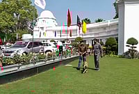 PTI : Security officials with a sniffer dog at the premises of the Delhi Legislative Assembly after it received a bomb threat via an email, in New Delhi.