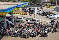 West Asia Conflict Impact: Global Growth Slows Amid Historic Energy Shock PTI : People wait in long queues at a gas station amid rumours of a fuel shortage in the wake of the West Asia conflict, in Nagpur.