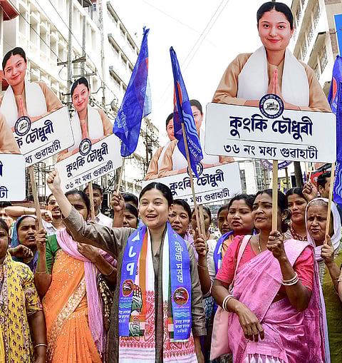 Assam Jatiya Parishad (AJP) candidate from Guwahati Central, Kunki Chowdhury, centre, campaigns for the Assam Assembly elections, in Guwahati.