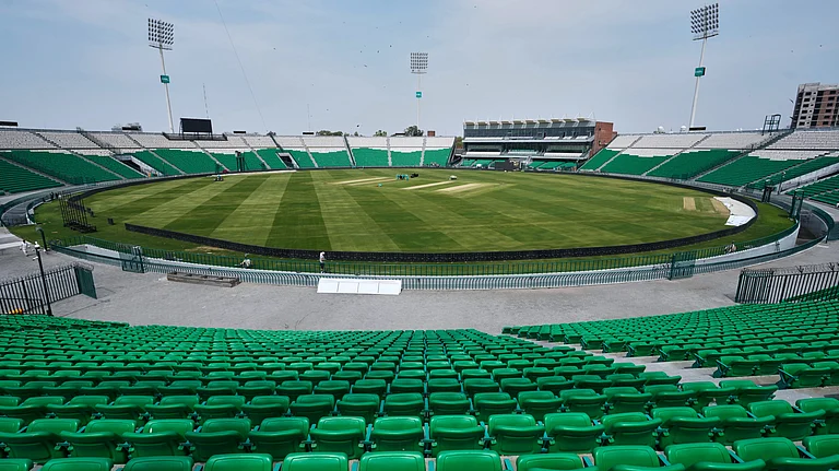 Groundsmen work at the at the Gaddafi Stadium in preparations for upcoming Pakistan's premier domestic T20 the Pakistan Super League, which will take place in empty stadiums due to the recent spike in oil prices, in Lahore, Pakistan, Tuesday, March 24, 2026 - (AP Photo/K.M. Chaudary)