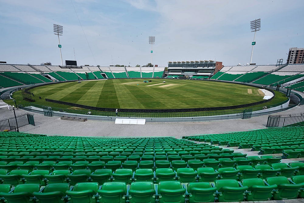 Groundsmen work at the at the Gaddafi Stadium in preparations for upcoming Pakistan's premier domestic T20 the Pakistan Super League, which will take place in empty stadiums due to the recent spike in oil prices, in Lahore, Pakistan. - | Photo: AP/K.M. Chaudary