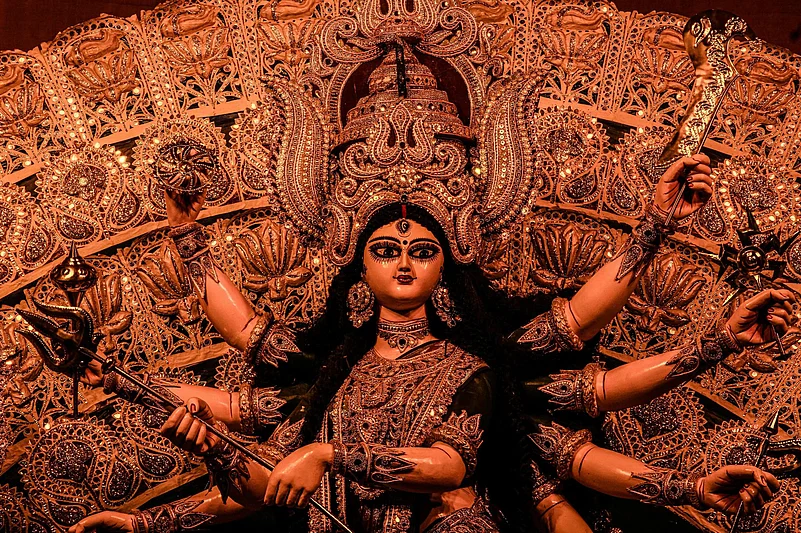 Goddess Durga idol with many arms and weapons