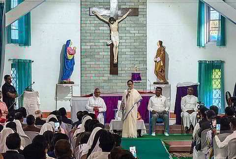 West Bengal Chief Minister Mamata Banerjee addresses the gathering during a visit to St Lucy Church, at Chalsa, in Jalpaiguri district.