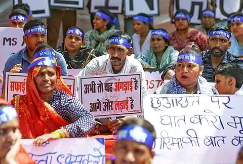 Safai Karmachari Andolan workers along with family members of the people who were killed in sewer and septic tanks stage a protest under the 'Stop Killing Us' campaign, at Jantar Mantar, in New Delhi.