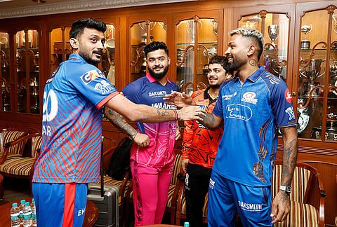 Indian Premier League team captains (from left) Axar Patel (Delhi Capitals), Riyan Parag (Rajasthan Royals), Ishan Kishan (Sunrisers Hyderabad, interim) and Hardik Pandya (Mumbai Indians) interact in Mumbai ahead of the meeting with the Board of Control for Cricket in India.