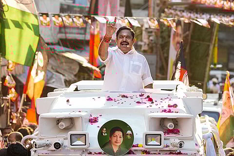 Leader of Opposition in the Tamil Nadu Assembly and AIADMK chief Edappadi K Palaniswami greets supporters during an election roadshow at the Mylapore constituency, ahead of the state Assembly elections, in Chennai district.