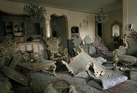 A damaged living room is seen in a house that was affected when a nearby residential building was hit in an overnight strike during the U.S.-Israeli military campaign in Tabriz, East Azerbaijan Province, northwestern Iran.