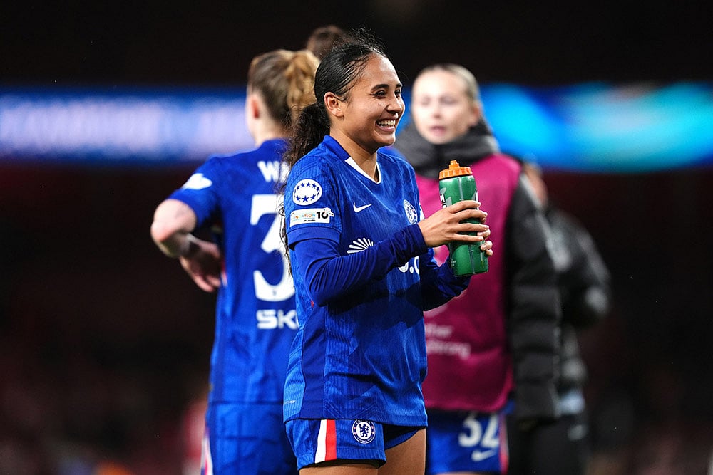 Chelsea's Alyssa Thompson smiles after the Women's Champions League soccer match between Arsenal and Chelsea in London. - | Photo: John Walton/PA via AP