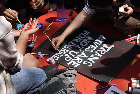 Supporters of the LGBTQIA+ community hold placards during a protest against the passage of the Transgender Persons (Protection of Rights) Amendment Bill, 2026, at Jantar Mantar in New Delhi. | Photo: Vikram Sharma/Outlook