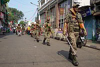 | Photo: PTI/Swapan Mahapatra : Security personnel keep vigil during a religious procession to mark the 'Ram Navami' festival, in Kolkata, West Bengal.