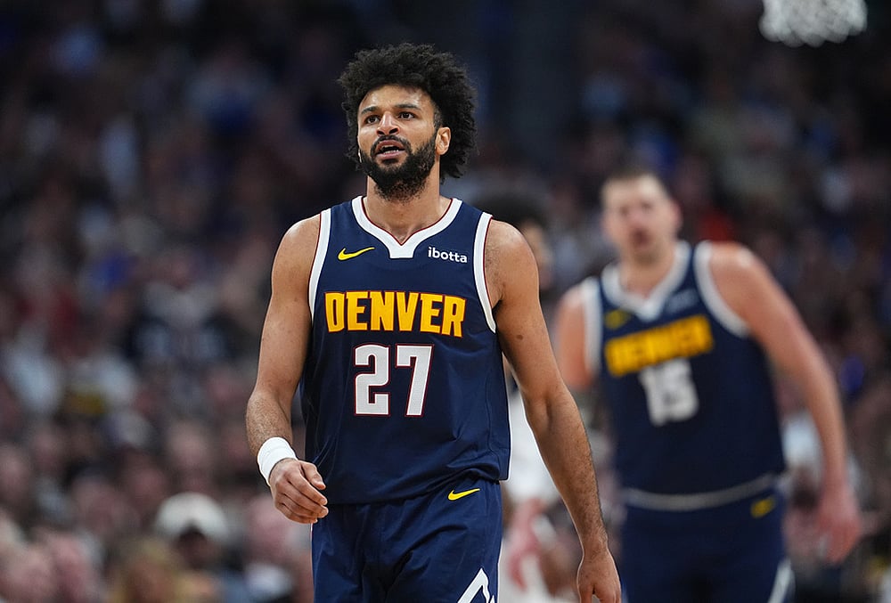 Denver Nuggets guard Jamal Murray reacts after hitting a basket and drawing a foul in the first half of an NBA basketball game against the Dallas Mavericks in Denver.  - | Photo: AP/David Zalubowski