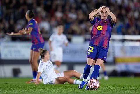 Barcelona's Ona Batlle reacts during the women's Champions League quarterfinal first leg soccer match between Real Madrid and Barcelona in Madrid, Spain.