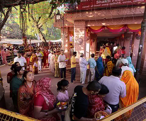 People gather at the 'Alopi Shankari Devi Shakti Peeth Mandir' to offer prayers on the occasion of 'Ram Navami' festival, in Prayagraj, Uttar Pradesh.