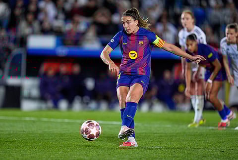 Barcelona's Alexia Putellas scores her side's sixth goal from the penalty spot during the women's Champions League quarterfinal first leg soccer match between Real Madrid and Barcelona in Madrid, Spain.