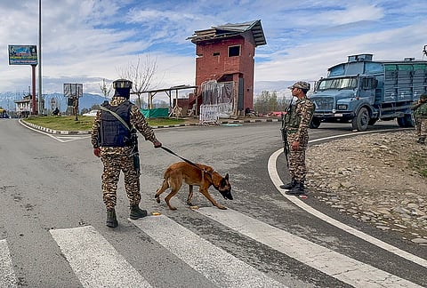 Security personnel keep vigil along the Jammu-Srinagar National Highway amid heightened security, in Anantnag, Jammu and Kashmir.