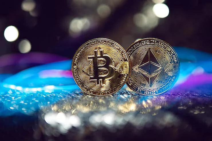 Bitcoin and Ethereum coins on a glowing background