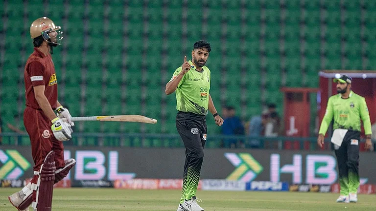 Haris Rauf celebrating a wicket during Lahore Qalandars vs Hyderabad Kingsmen PSL 2025-26 match at Gaddafi Stadium. - thePSLt20/X