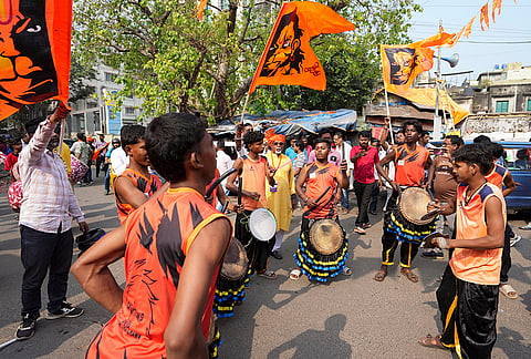 Artists perform during a religious procession to mark the 'Ram Navami' festival, in Kolkata, West Bengal.