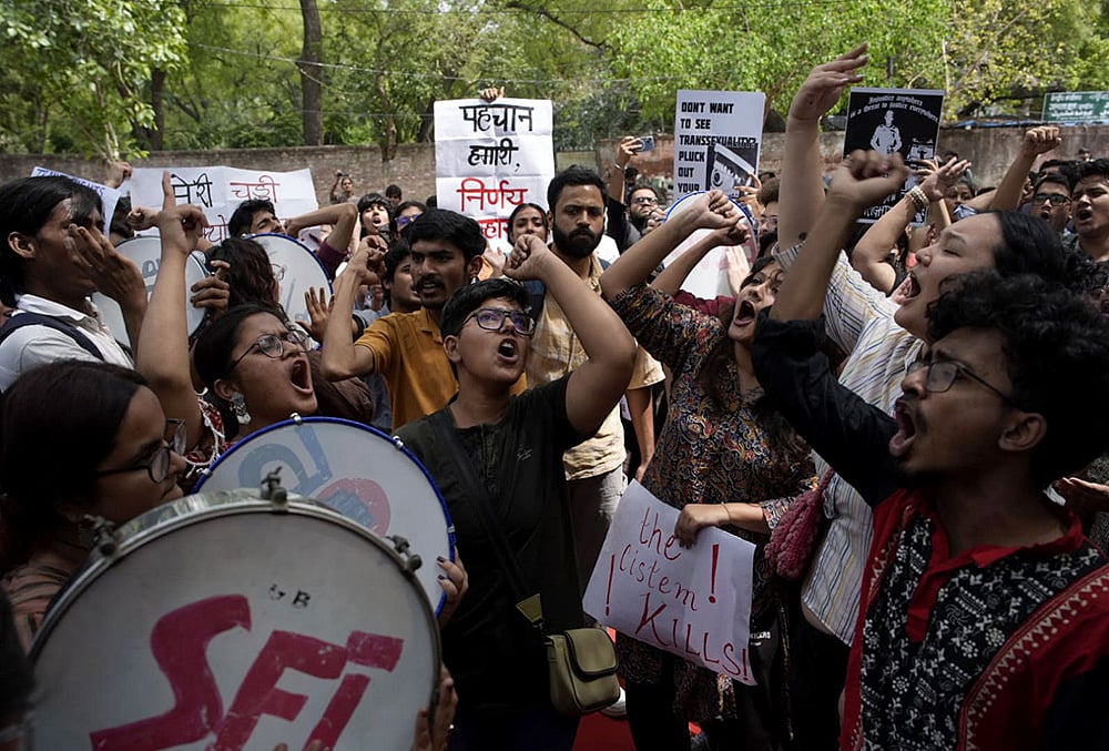 Supporters of the LGBTQIA+ community hold placards during a protest against the passage of the Transgender Persons (Protection of Rights) Amendment Bill, 2026, at Jantar Mantar in New Delhi. | Photo: Vikram Sharma/Outlook - null